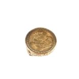 9 ct yellow gold sovereign ring.