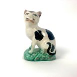 A rare Staffordshire ceramic model of a cat, circa 1810