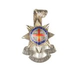 Militaria: A Royal Sussex Regiment officer's enamelled silver cap badge