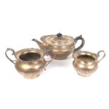 A matched Edwardian & George V three piece silver tea set