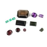 Collection of loose gemstones.