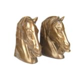 A pair of bronze horse head book ends, 20th century