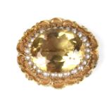 Yellow gold citrine and pearl brooch.