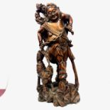 A large Chinese carved wood figural group