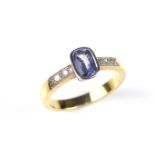 Yellow gold iolite ring.