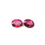 Pair of pink topaz oval cut loose stones.