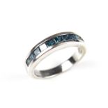 10 ct white gold blue diamond half eternity ring.