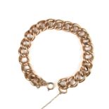 Rose gold curb chain bracelet.