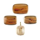 Three yellow gold picture agate brooches and a yellow gold agate pendant.