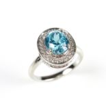 18 ct white gold blue tourmaline and diamond ring.