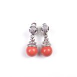 18 ct white gold coral and diamond earring pendants.