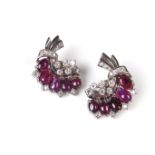 White gold ruby and diamond spray earrings.