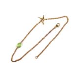 18 ct yellow gold peridot starfish bracelet.