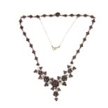 Garnet floral fringe necklace.
