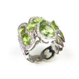 18 ct white gold peridot and diamond ring.