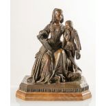 Scultura in bronzo patinato raffigurante “Figura femminile con libro aperto e paggetto”,