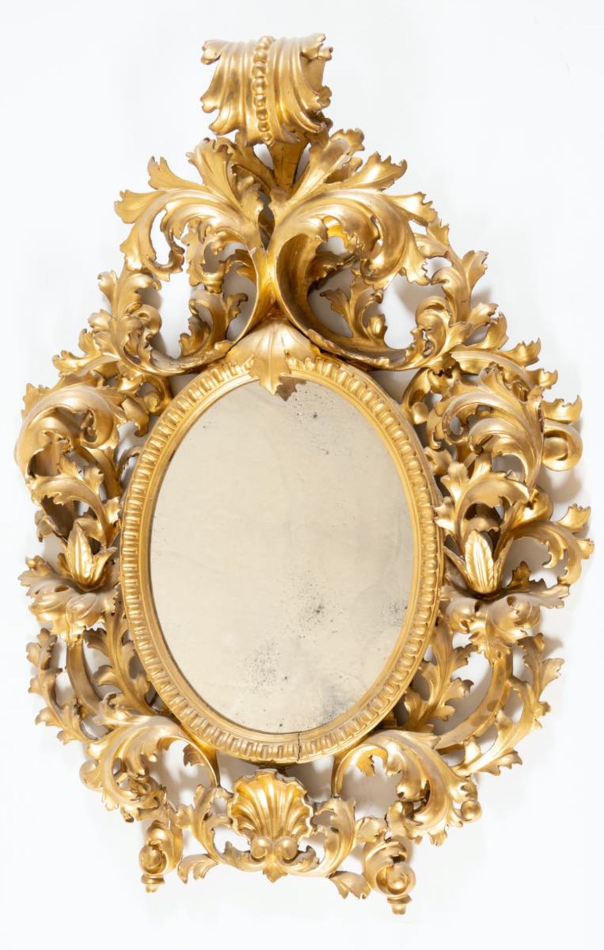 Specchiera in legno intagliato e dorato, Firenze, fine del XIX-inizi del XX secolo.Cornice