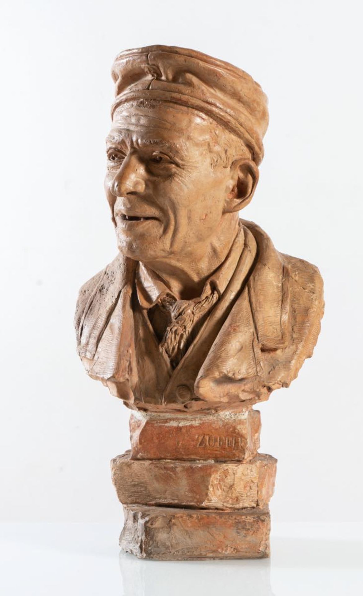 Ambrogio Zuffi (Ferrara 1833 - 1922), Scultura in terracotta raffigurante "Busto maschile".Reca