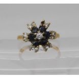 A 9ct gold sapphire and cz cluster ring (one cz missing) size L, weight 2.9gms Condition report: