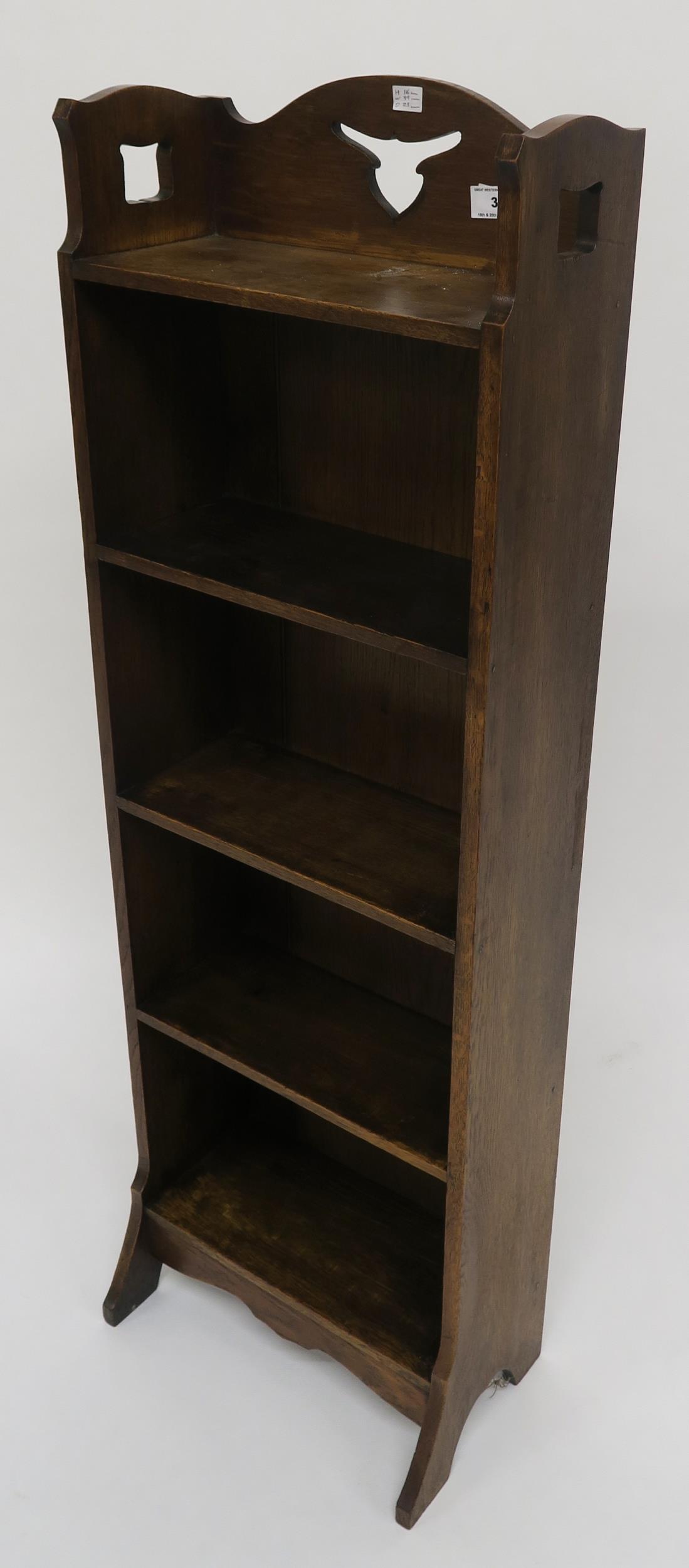 An early 20th century oak arts and crafts five shelf bookcase with pierced design to top shelf 116cm