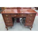 A 20th century mahogany desk on cabriole supports 82cm high x 107cm wide x 47cm deep Condition