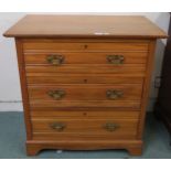 A 20th century pine three drawer chest with brass drawer pulls 82cm high x 84cm wide x 52cm deep