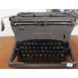 A 20th century Underwood typewriter and drop leaf occasional table (2) Condition report: Available