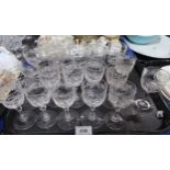 A lot comprising a selection of port glasses with grape & vine etched decoration, others with