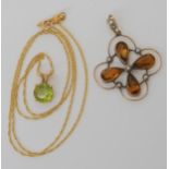A 14k gold peridot pendant and chain weight together 2.3gms, and a 9ct Edwardian citrine and pearl