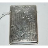 A silver card case, Birmingham 1904, rectangular with foliate engraved decoration, the cartouche