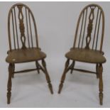 A set of six 20th century beech rail back dining chairs (6) Condition report: Available upon