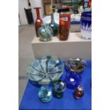 A collection of Mdina glass to include a bowl, axe head vase, other vases and assorted other