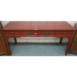 A 20th century red lacquered Chinese four drawer altar table with metal drawer pulls 82cm high x