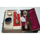 A lot comprising two silver spoons, a thimble, a salt, a napkin ring, all assorted marks (5) 86