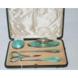 A cased five-piece silver and enamel manicure set, Birmingham 1925 Condition report: Available