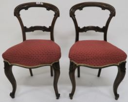 A set of six Victorian rosewood balloon back parlour chairs (6) Condition report: Available upon