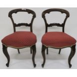 A set of six Victorian rosewood balloon back parlour chairs (6) Condition report: Available upon