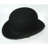 A bowler hat by Jacksons Ltd, worn condition and two theatre prints (3) Condition report: