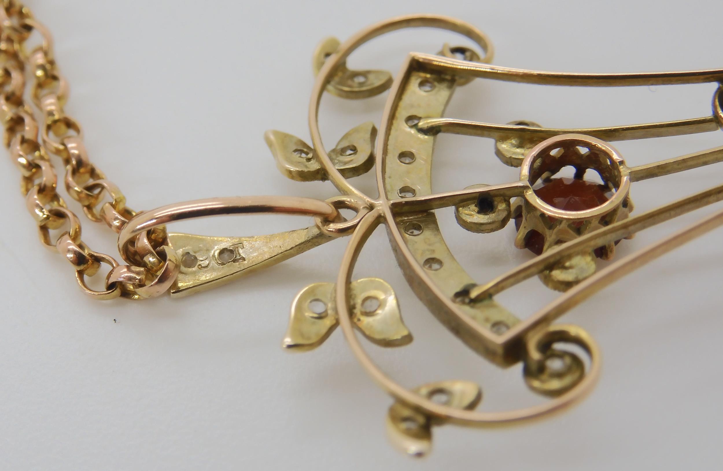 An Edwardian 9ct gold pendant set with garnet and clear gems, with a 9ct belcher chain, length 45cm, - Image 2 of 2