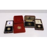 A lot comprising a cased gold proof half sovereign 1980, two cased 1/10 oz. gold proof coins & a