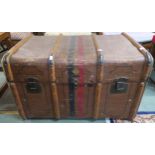 A 20th century Liprosta wood bound travel trunk, a brass framed tapestry fire screen, a wall