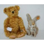 A modern Steiff Teddy bear, 30cm long and a modern Steiff Poppel, 15cm high (2) Condition report: