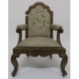 A 19th century oak framed upholstered armchair with embroidered back 97cm high Condition report: