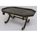 A 20th century lacquered X framed occasional table with painted top 46cm high x 103cm long x 60cm