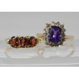 A 9ct gold garnet ring, size N, together with an amethyst and clear gem set ring weight together 4.