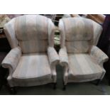 A pair of 20th century upholstered wingback armchairs and a matching Ottoman (3) Condition report: