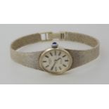 A 9ct white gold Rotary watch with a blue gem set winder. length of strap 17cm, weight 16.4gms