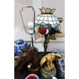 A lot comprising a painted plaster lamp base modelled as a horse, a resin and brass lamp base