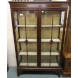 An Edwardian mahogany glazed display cabinet 137cm high x 88cm wide x 33cm deep Condition report: