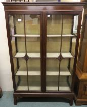 An Edwardian mahogany glazed display cabinet 137cm high x 88cm wide x 33cm deep Condition report: